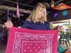 Janet is holding the neckerchief from Brenda Golden dedicated to Mike Batman Beatty.
